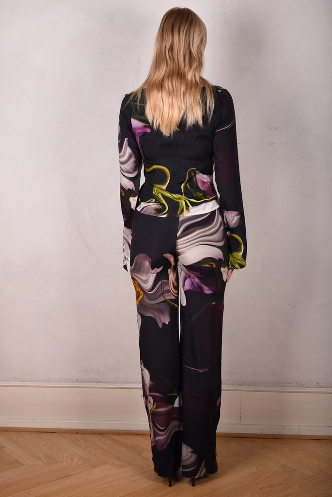 M.BARKER Pants. Stretch silk crepe-satin pants in print "Deflowered" - Tone Barker Silk