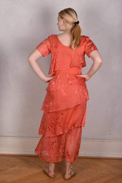 Ann-Frida, Maxi dress in several layers of silk. (Coral Red)